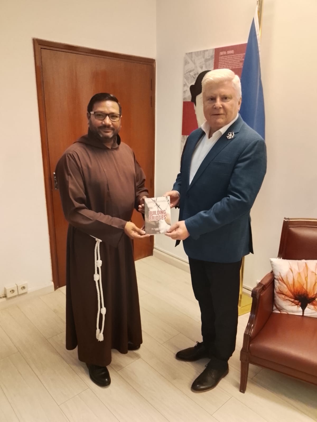 Fr. Lazar Aslam, OFM Cap presenting Building Bridges to H.E. Ladislav Steinhübel, Ambassador of the Czech Republic to Pakistan