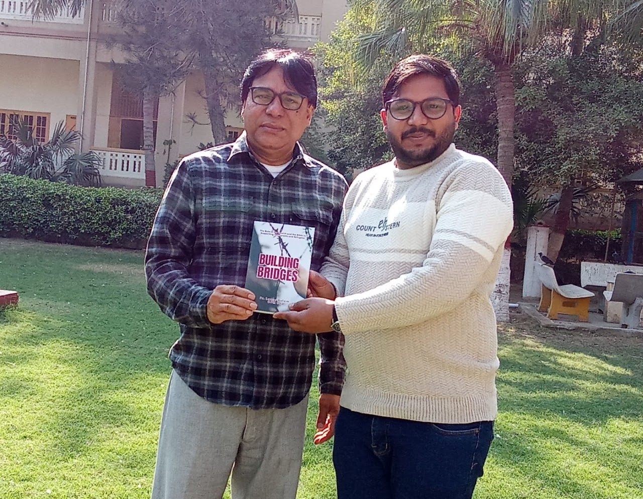 Presenting the book in the garden