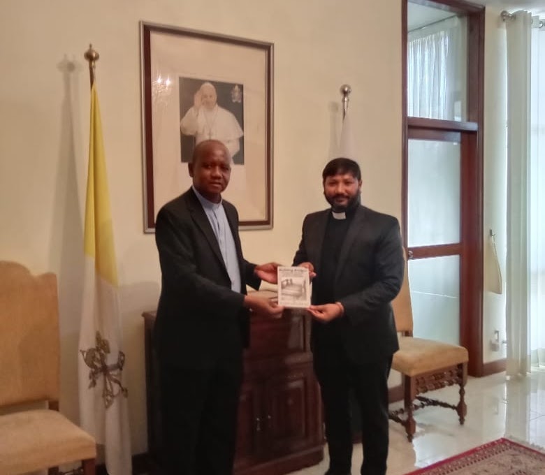 Presenting the book to the Apostolic Nuncio